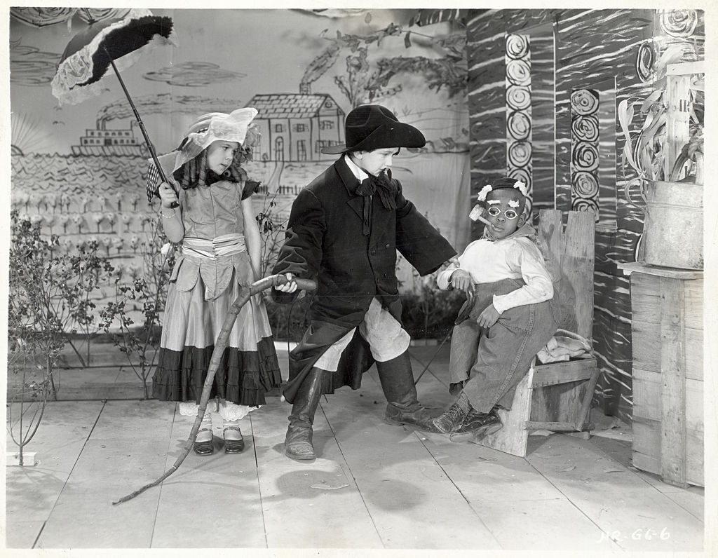 dorothy deborba with dress and umbrella on set