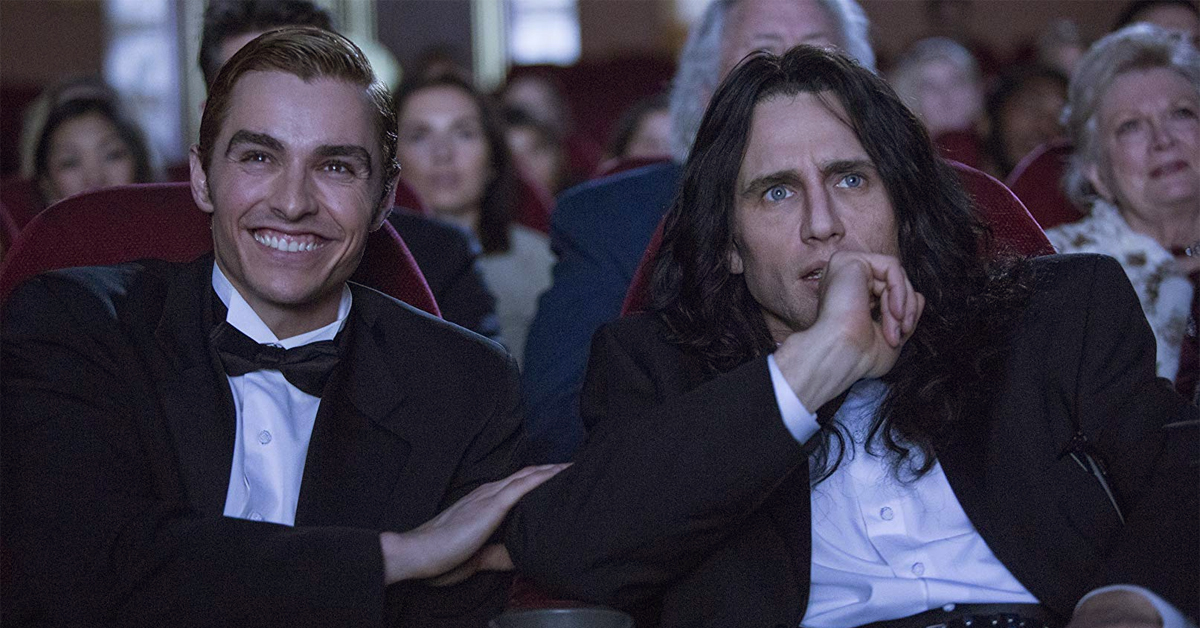 dave and james franco watching a movie screen