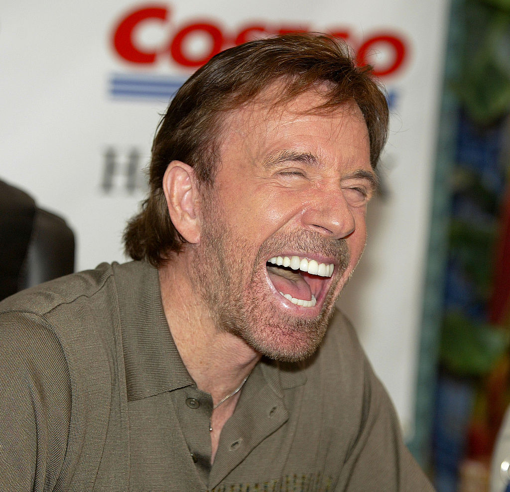 chuck norris laughing at a joke