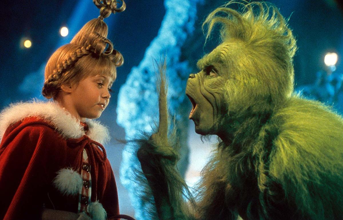 taylor momsen dressed as cindy lou who and jim carrey dressed as the grinch in how the grinch stole christmas