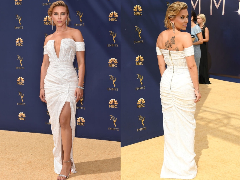Scarlett Johanson wears a sinched, white dress.