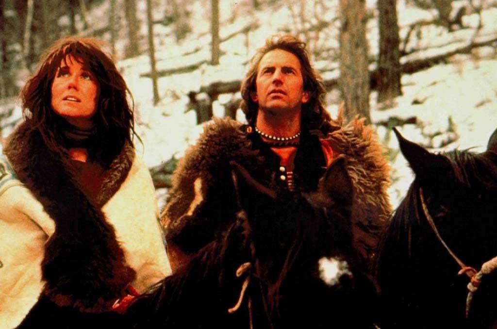 Costner and actress in the snow