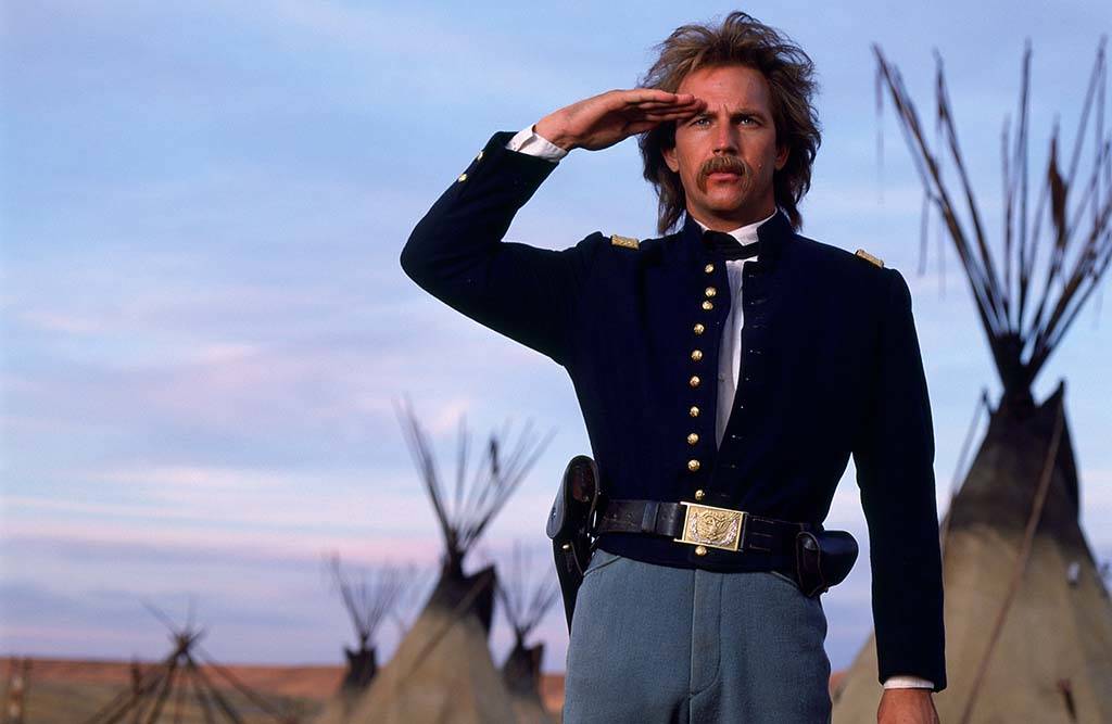 Costner saluting