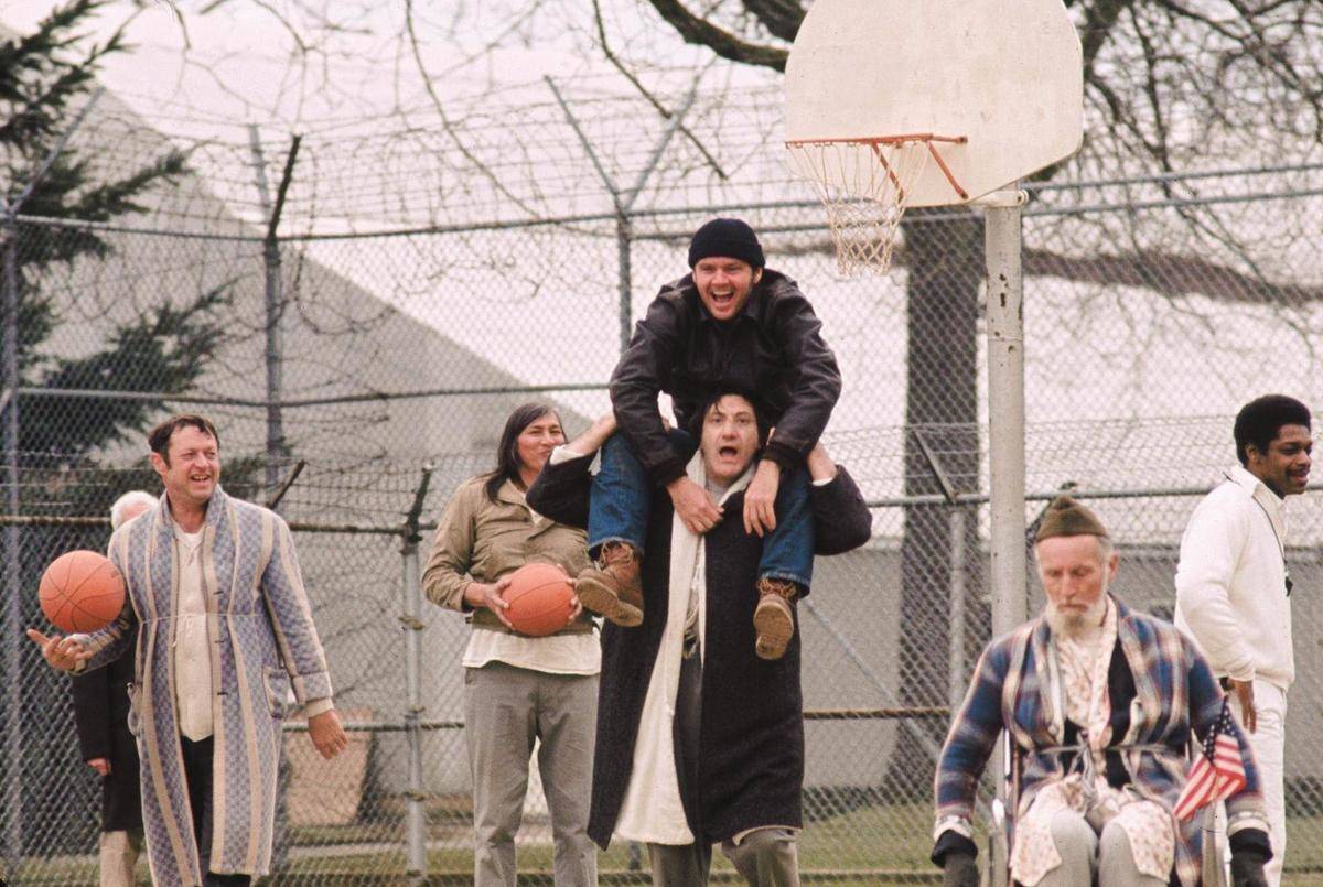 Jack Nicholson on someone's shoulders