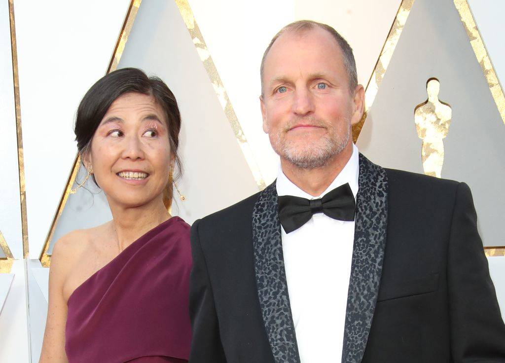Laura Louie (L) and Woody Harrelson attend the 90th Annual Academy Awards