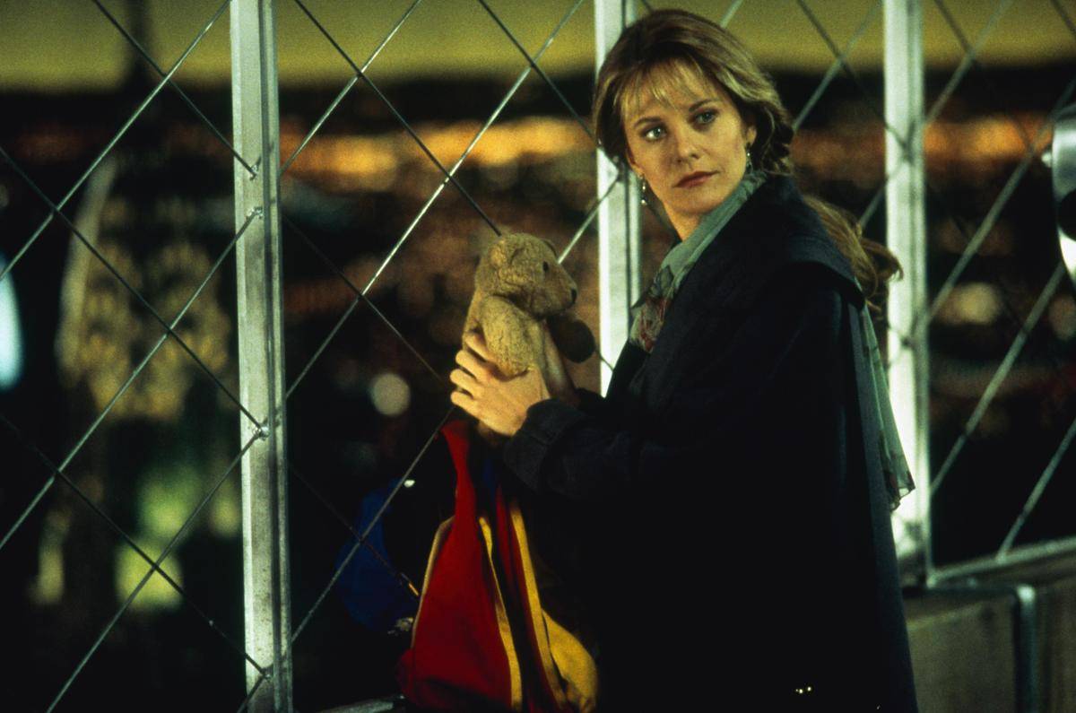 Meg Ryan holding a teddy bear in sleepless in seattle
