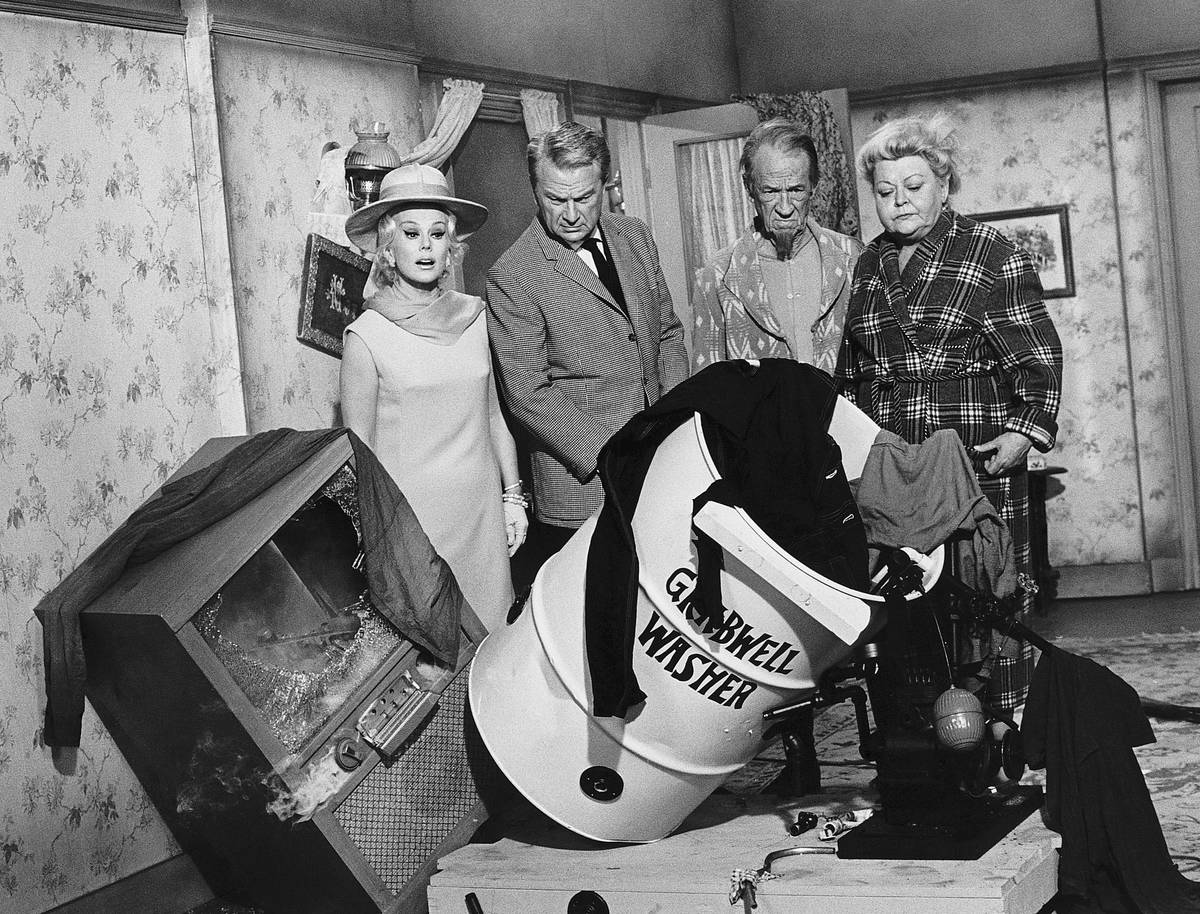 Cast of Green Acres Looking at Washing Machine