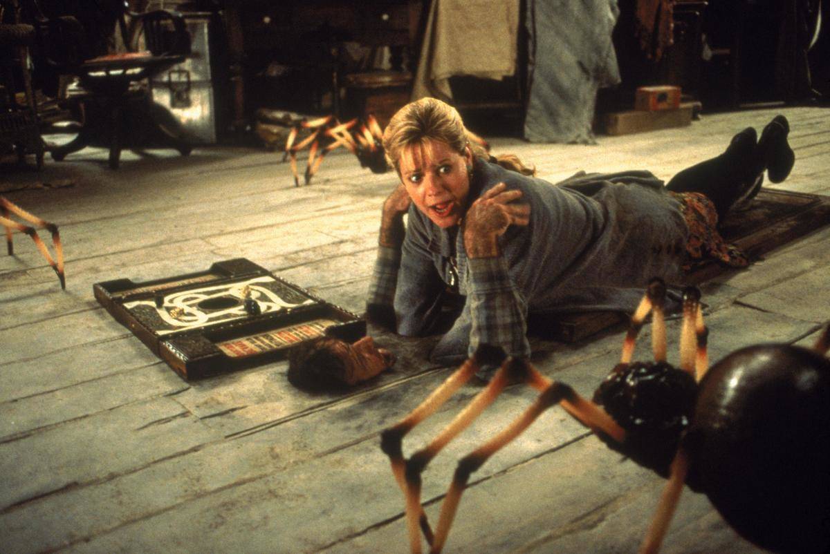 Still from Jumanji movie, giant spiders