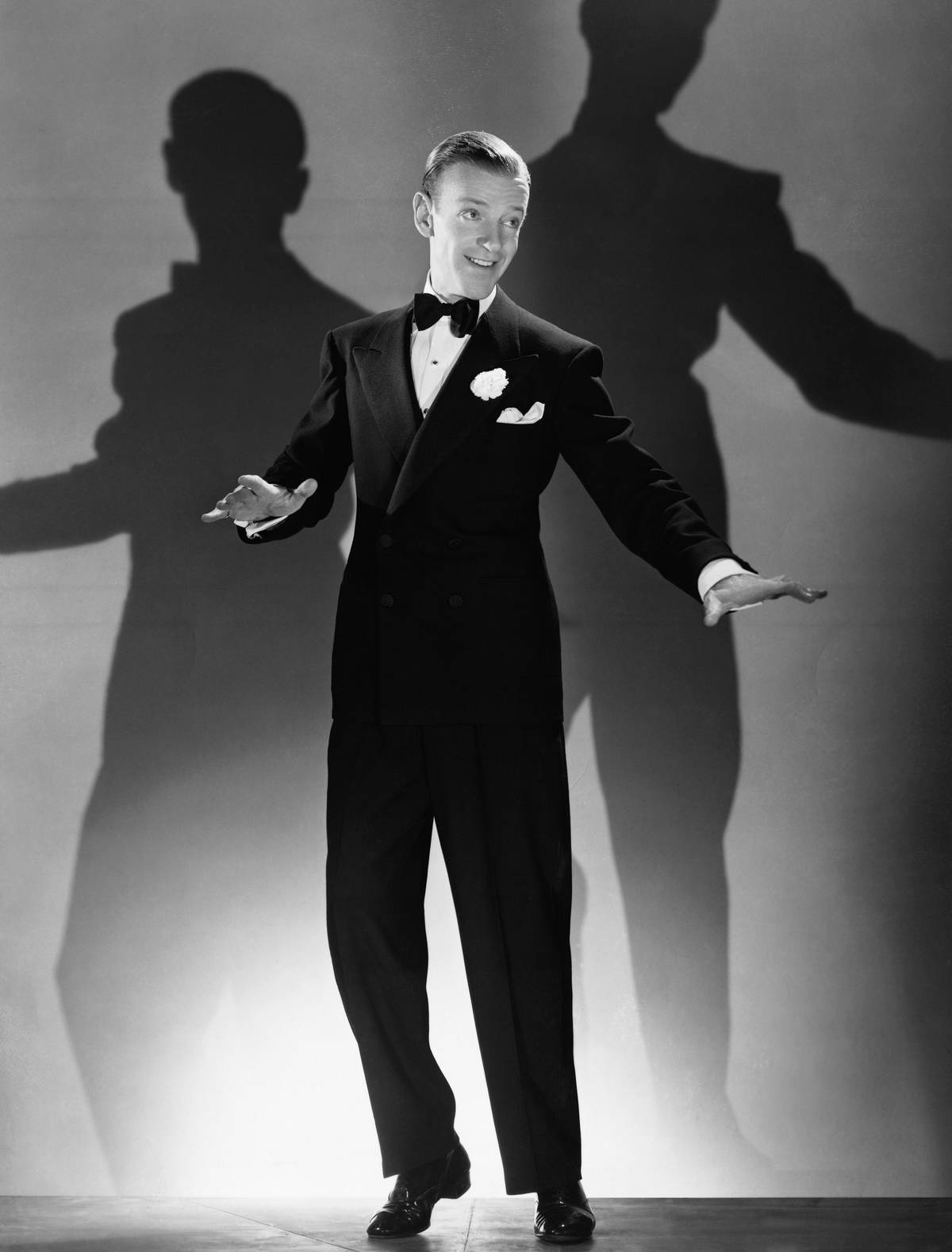 Actor Fred Astaire Dancing in Tuxedo