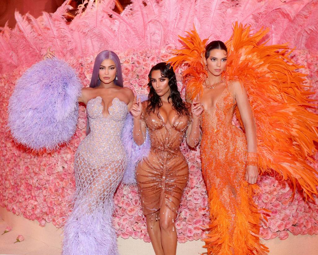 Kylie Jenner, Kim Kardashian West and Kendall Jenner attend The 2019 Met Gala in showgirl outfits