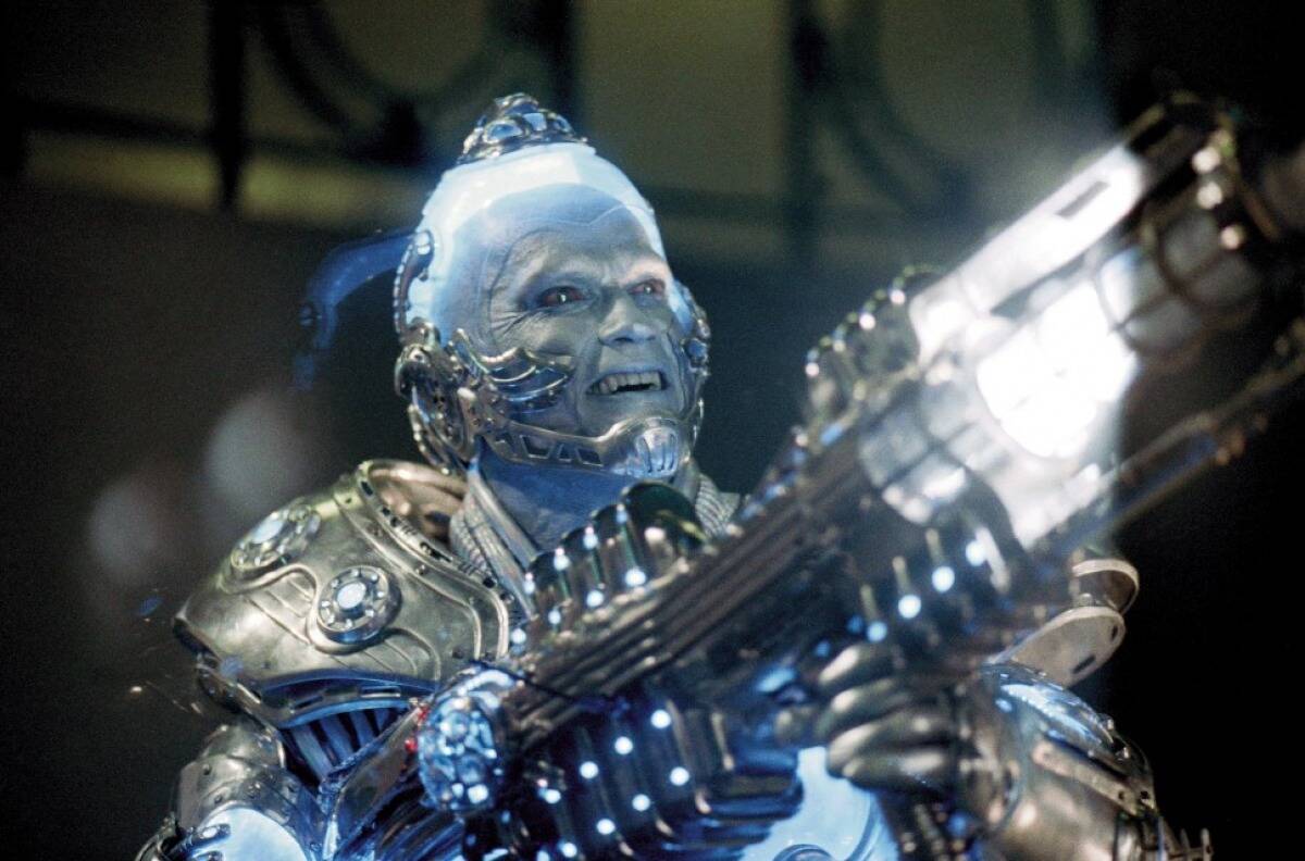 Arnold Schwarzenegger holding freeze ray as Mr. Freeze in Batman & Robin