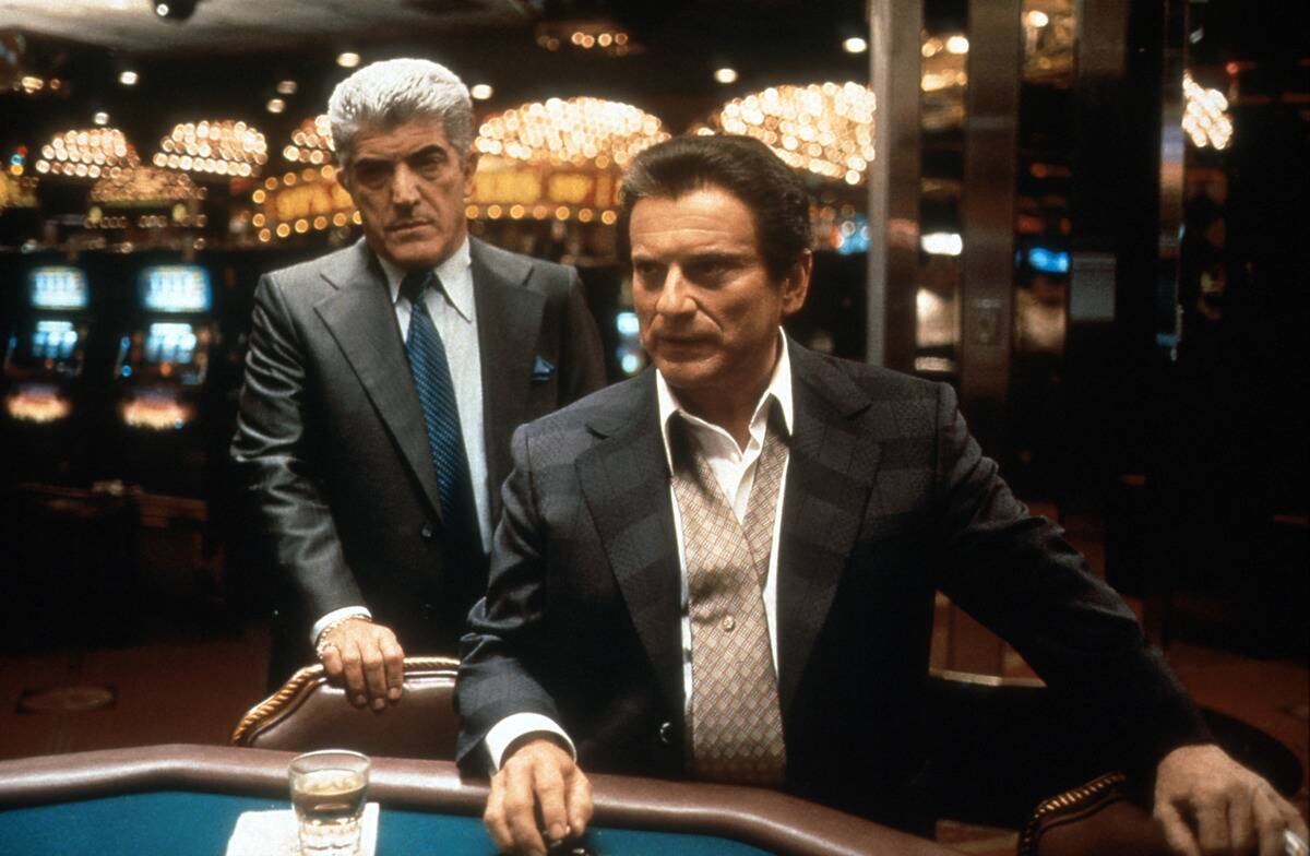 Joe Pesci and Frank Vincent standing at card table as Nicky Santoro and Frank Marino in Casino