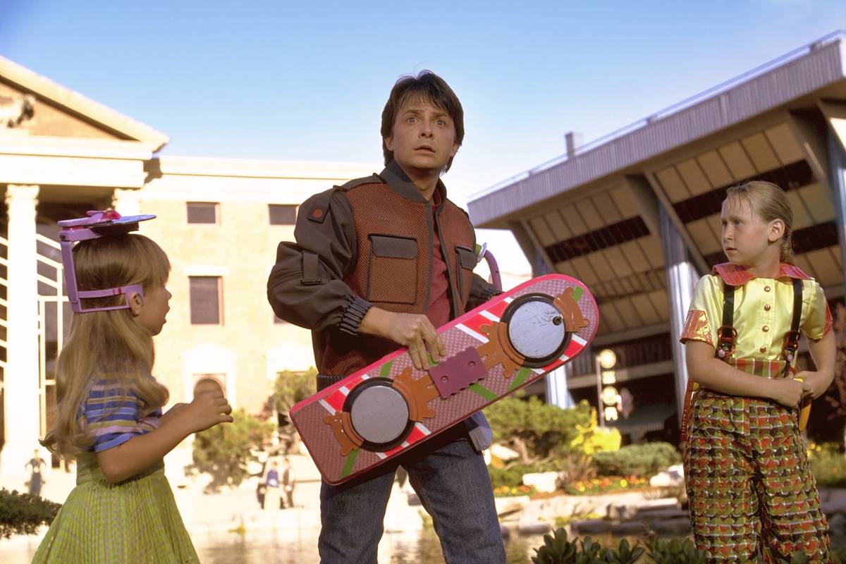 Michael J. Fox holding hover board in [redacted]