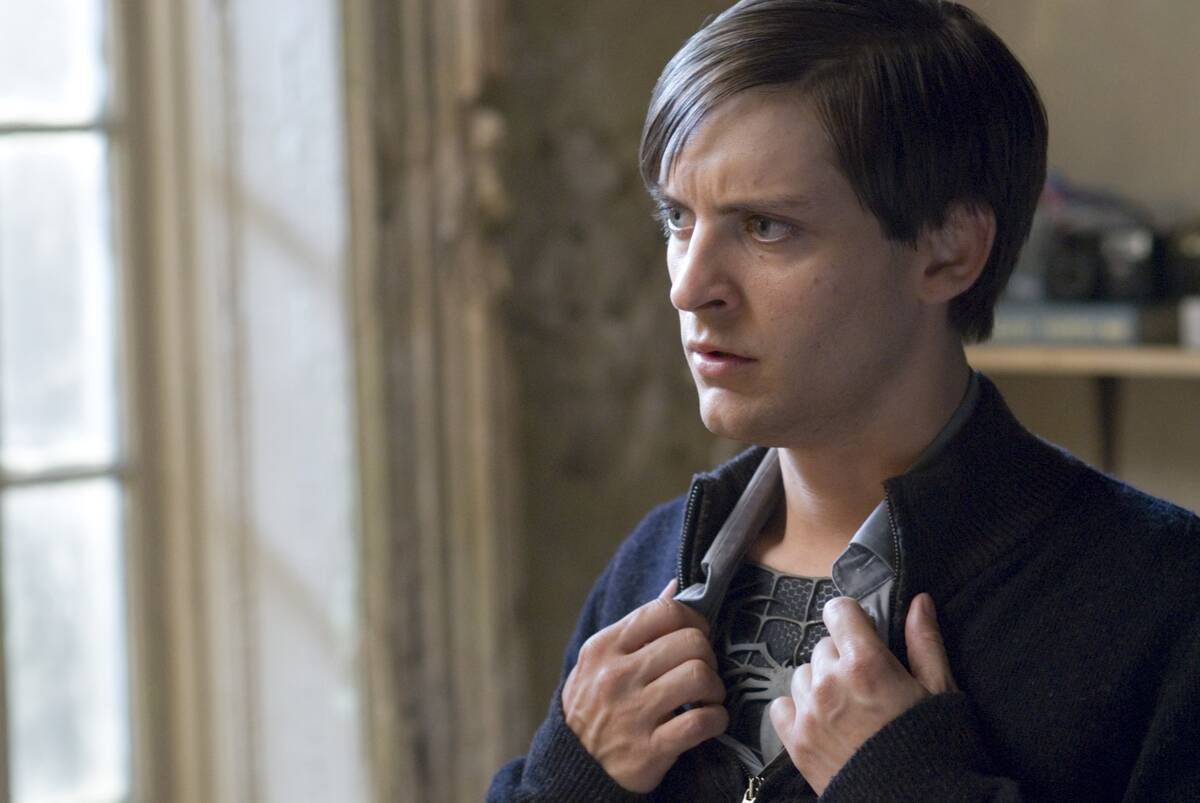 Tobey Maquire opening shirt to reveal Symbiote Spider-Man outfit in Spider-Man 3