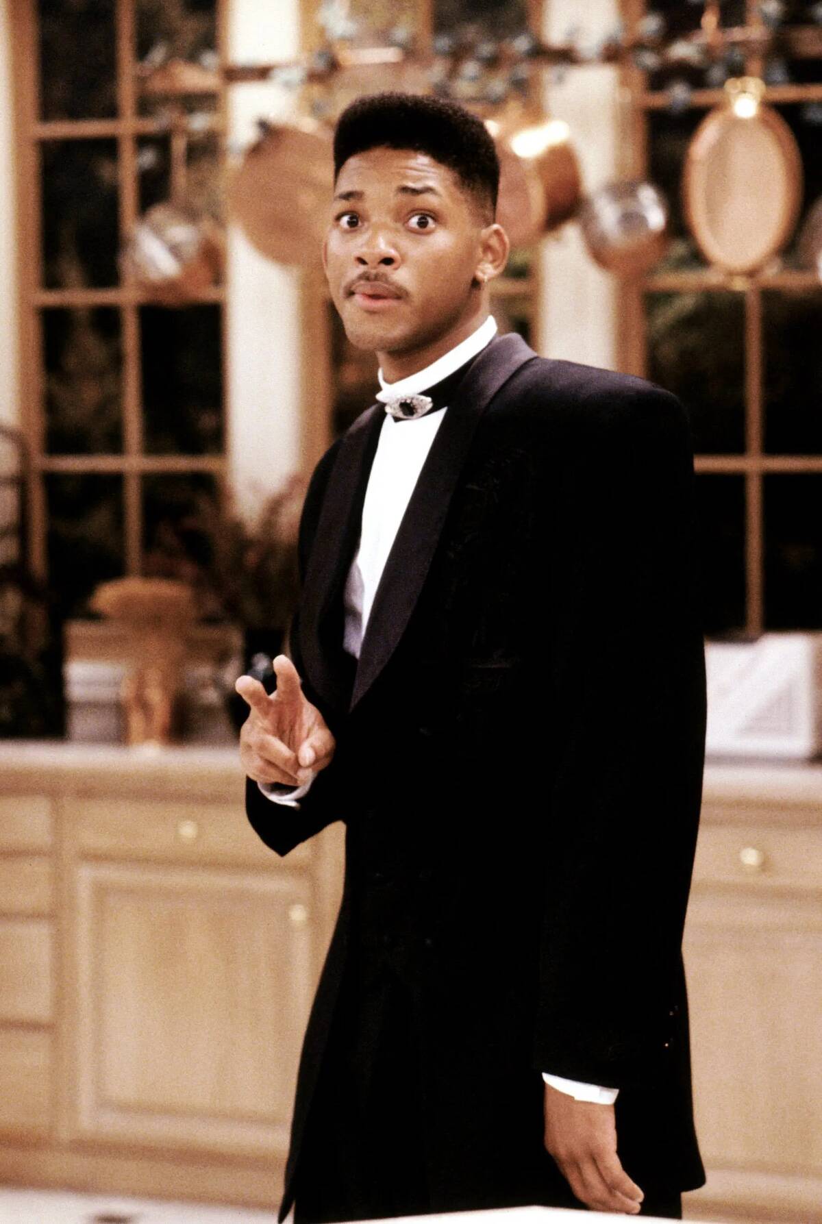 Will Smith awkwardly making peace sign in tuxedo in the Fresh Prince of Bel-Air