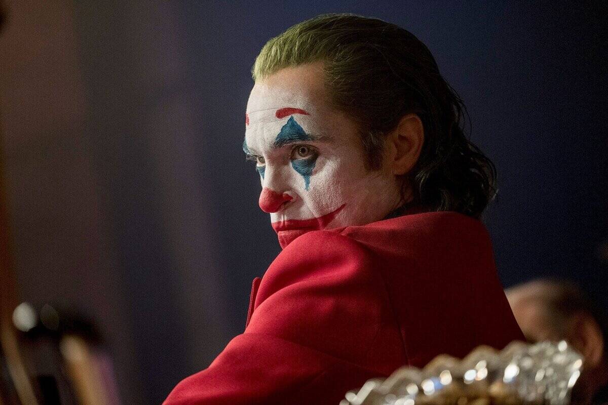 Joaquin Phoenix staring intensely as Arthur Fleck in Joker