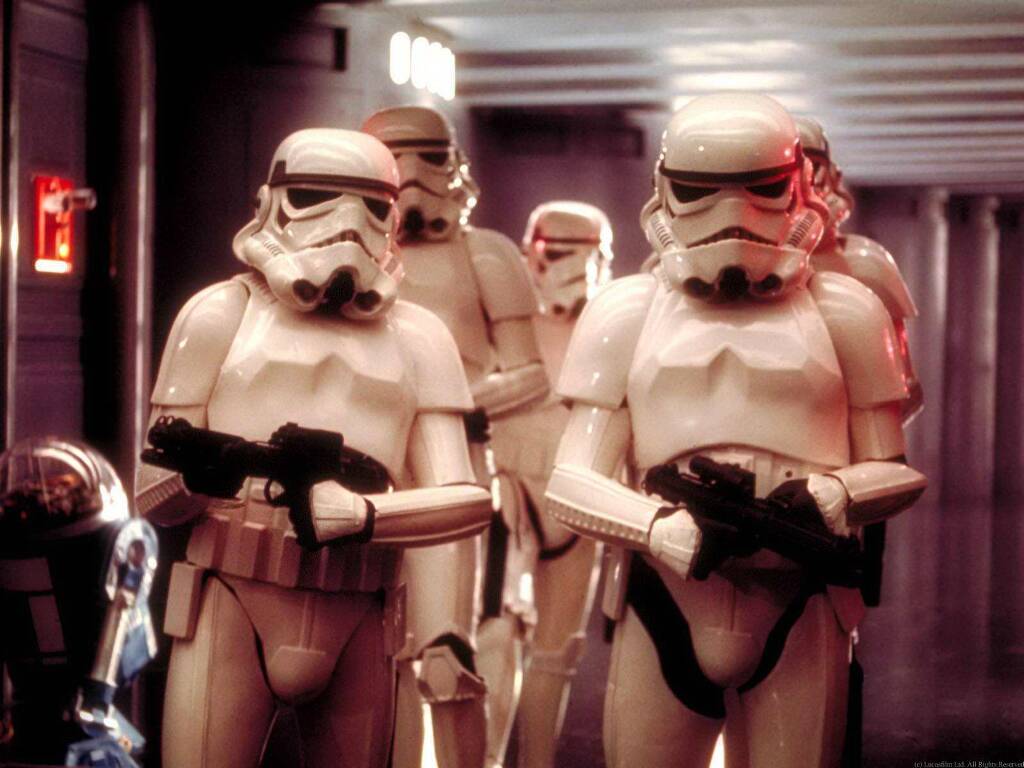 Stormtroopers walking through corridor in Star Wars