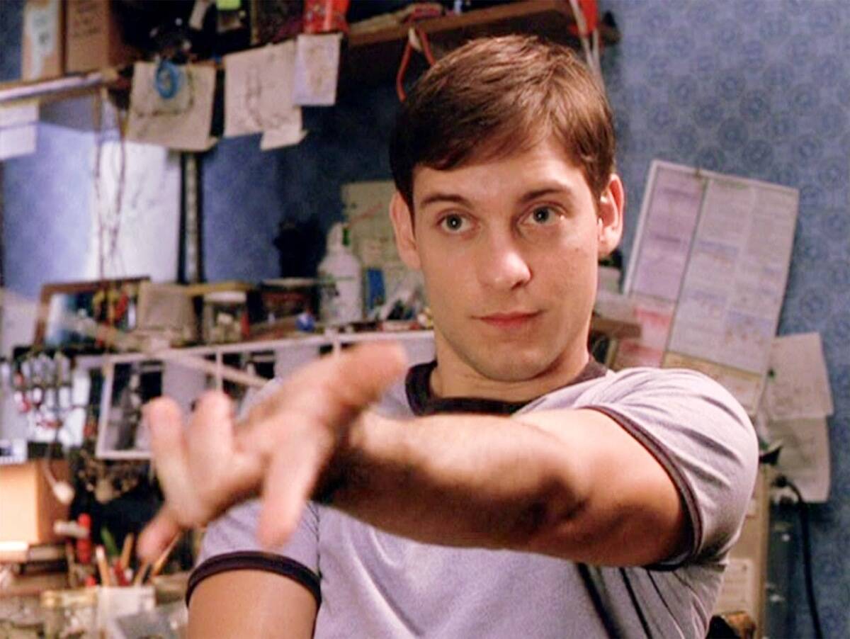 Tobey Maquire testing web powers in bedroom as Peter Parker in Spider-Man