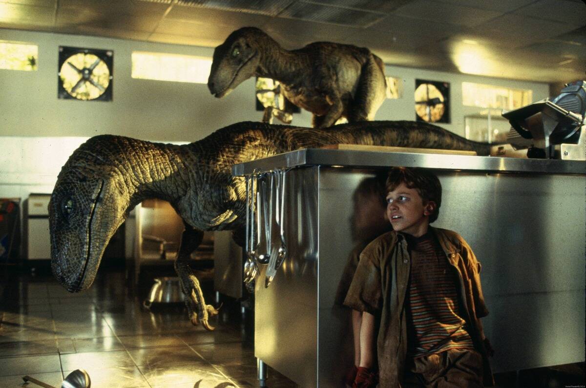 raptors menacing child in kitchen in Jurassic Park