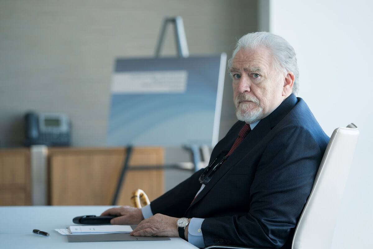 Brian Cox looking sad at table as Logan Roy in Succession