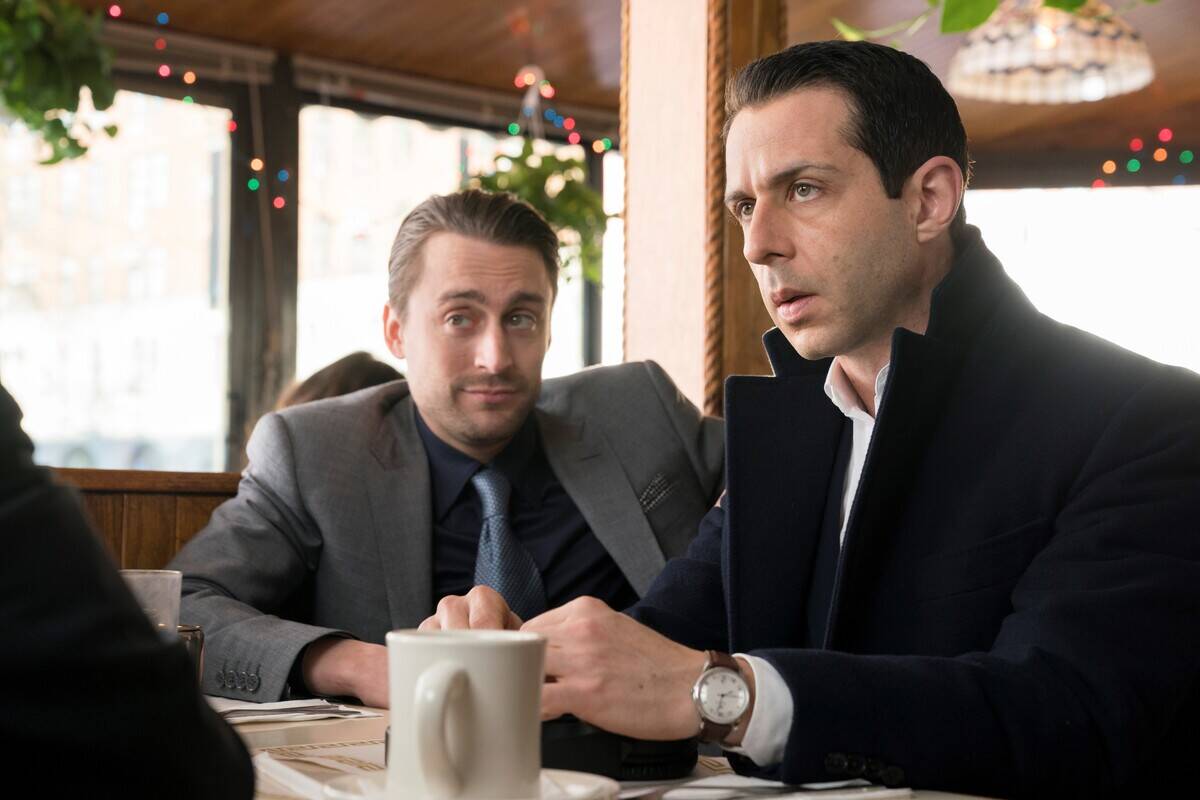 Kieran Culkin and Jeremy Strong reacting in diner in Succession