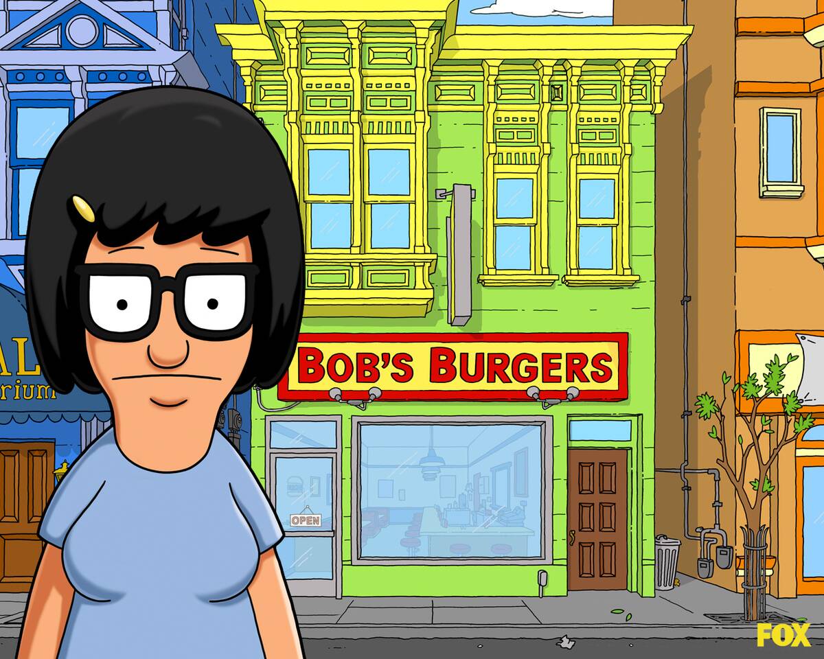 tina belcher in front of bob's burger's sign