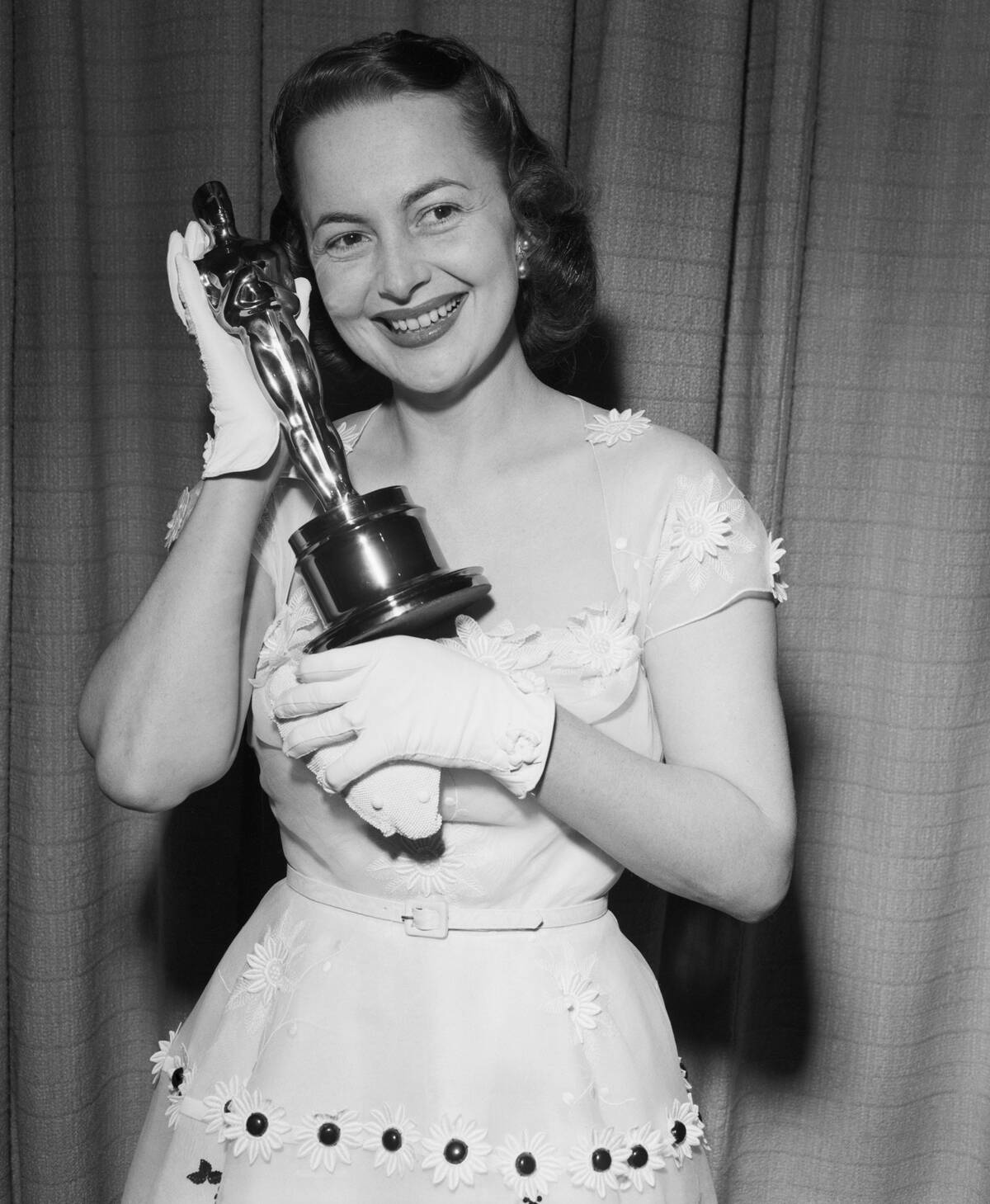 Olivia De Havilland Holding Her Oscar